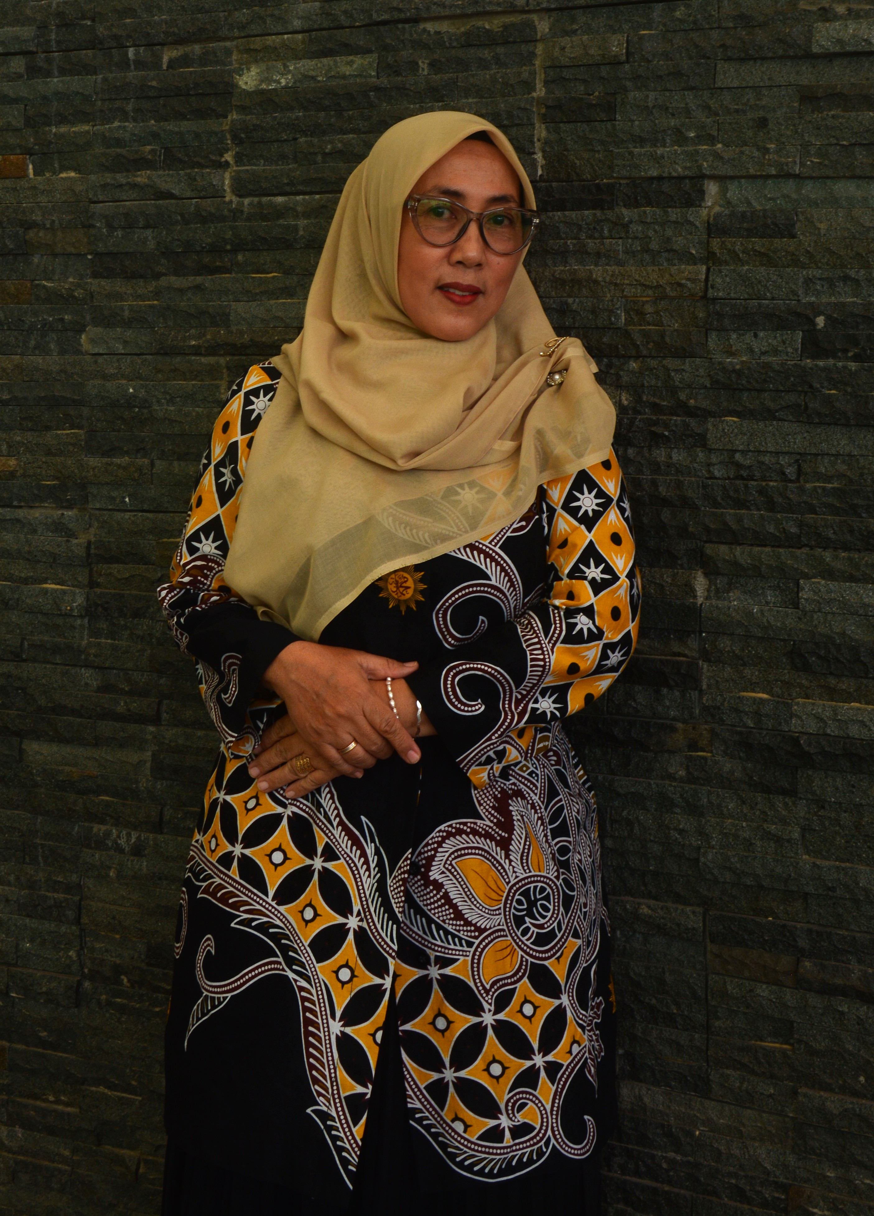 Rahmi Dwita, SH., M.Pd.